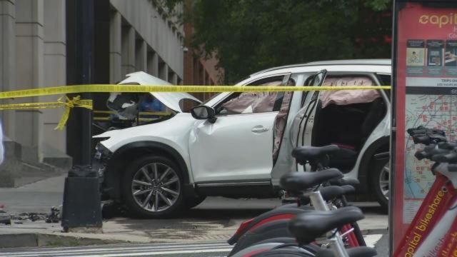 Police Say a Woman Died When Her Stolen Suv Crashed Into a Building and Killed Her