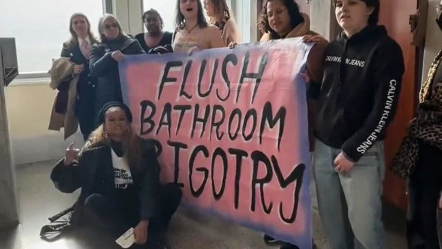 People Who Support Transgender Rights Hold a Sit-in Protest in a Bathroom at the U.S. Capitol